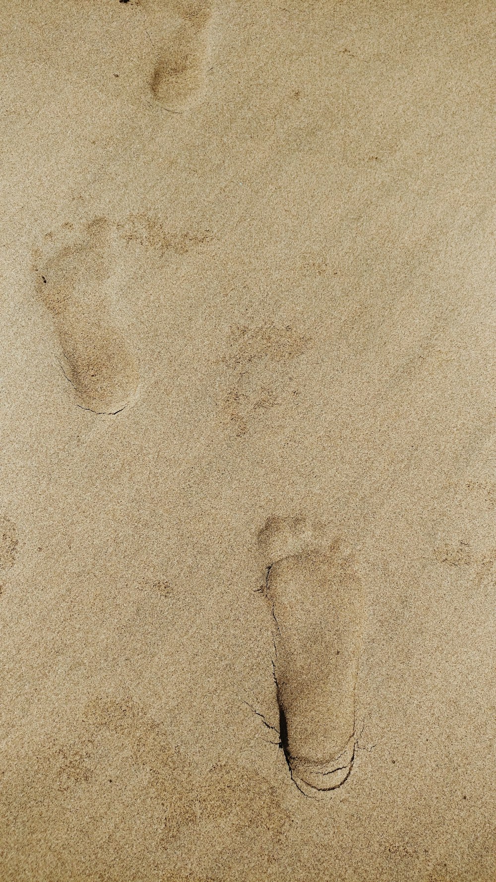 close-up photo of sand foot print