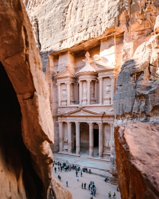 The ancient Treasury of Petra carved into rose-red sandstone cliffs