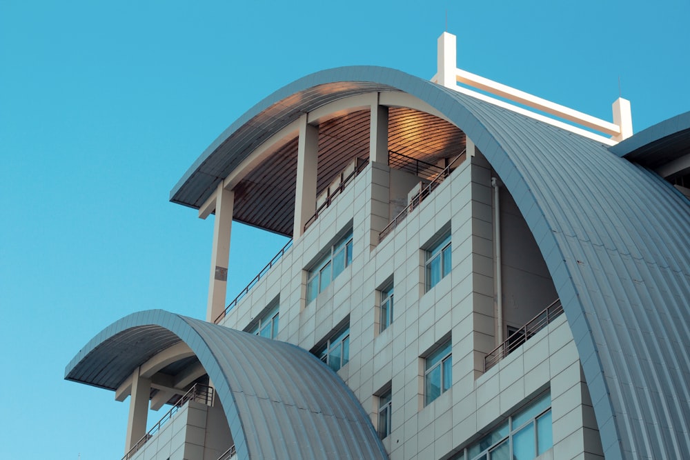 gray concrete building under blue sky at daytime