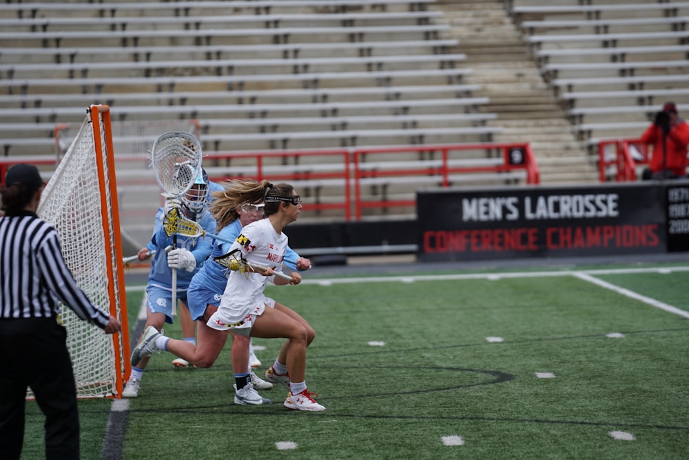 women playing lacrosse