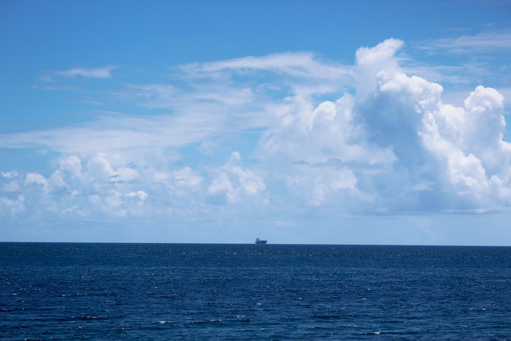 gray cruiser ship in the middle of ocean