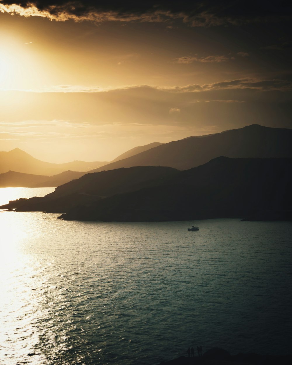 boat on body of water during golden hour