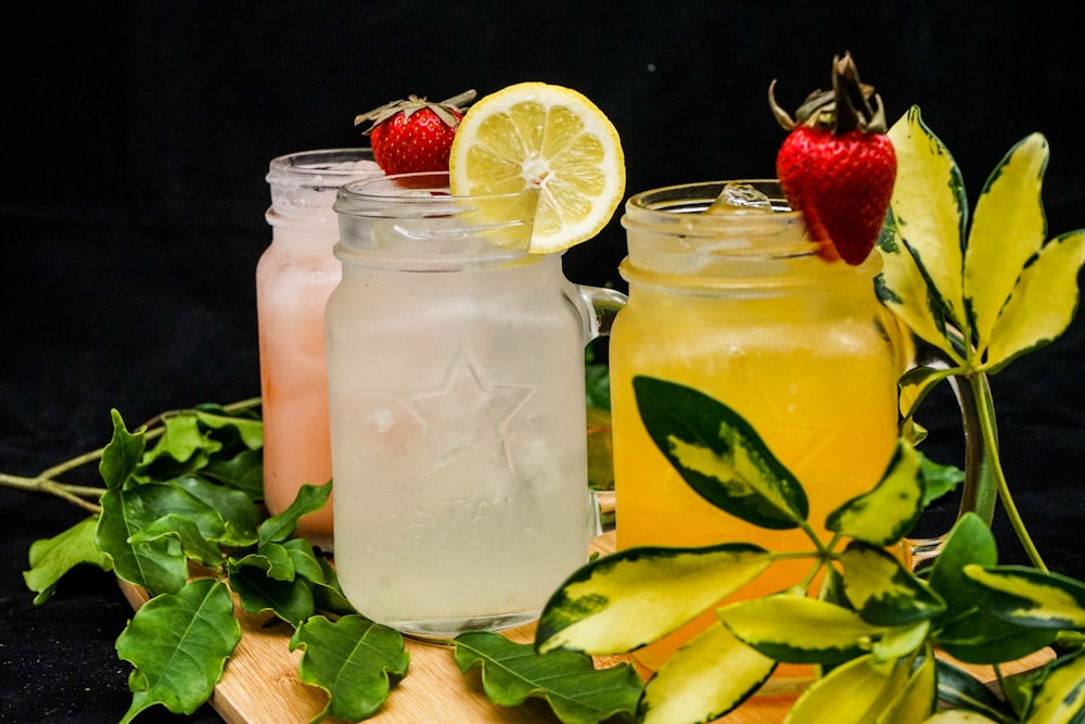 three mason jars of drinks