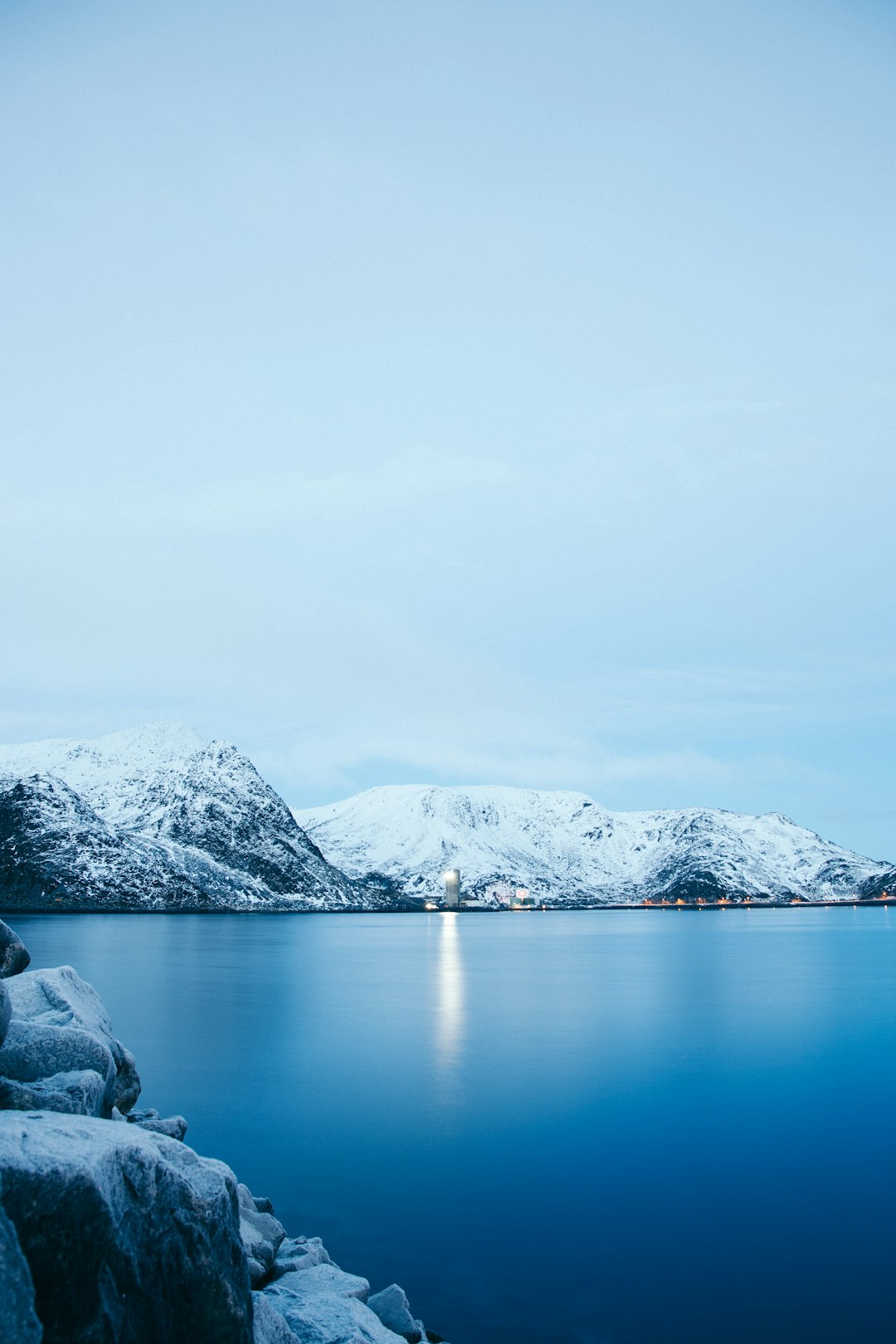 lake near snow mountain raneg