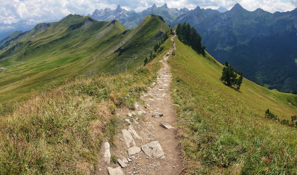 mountain trails under blue sky during daytime