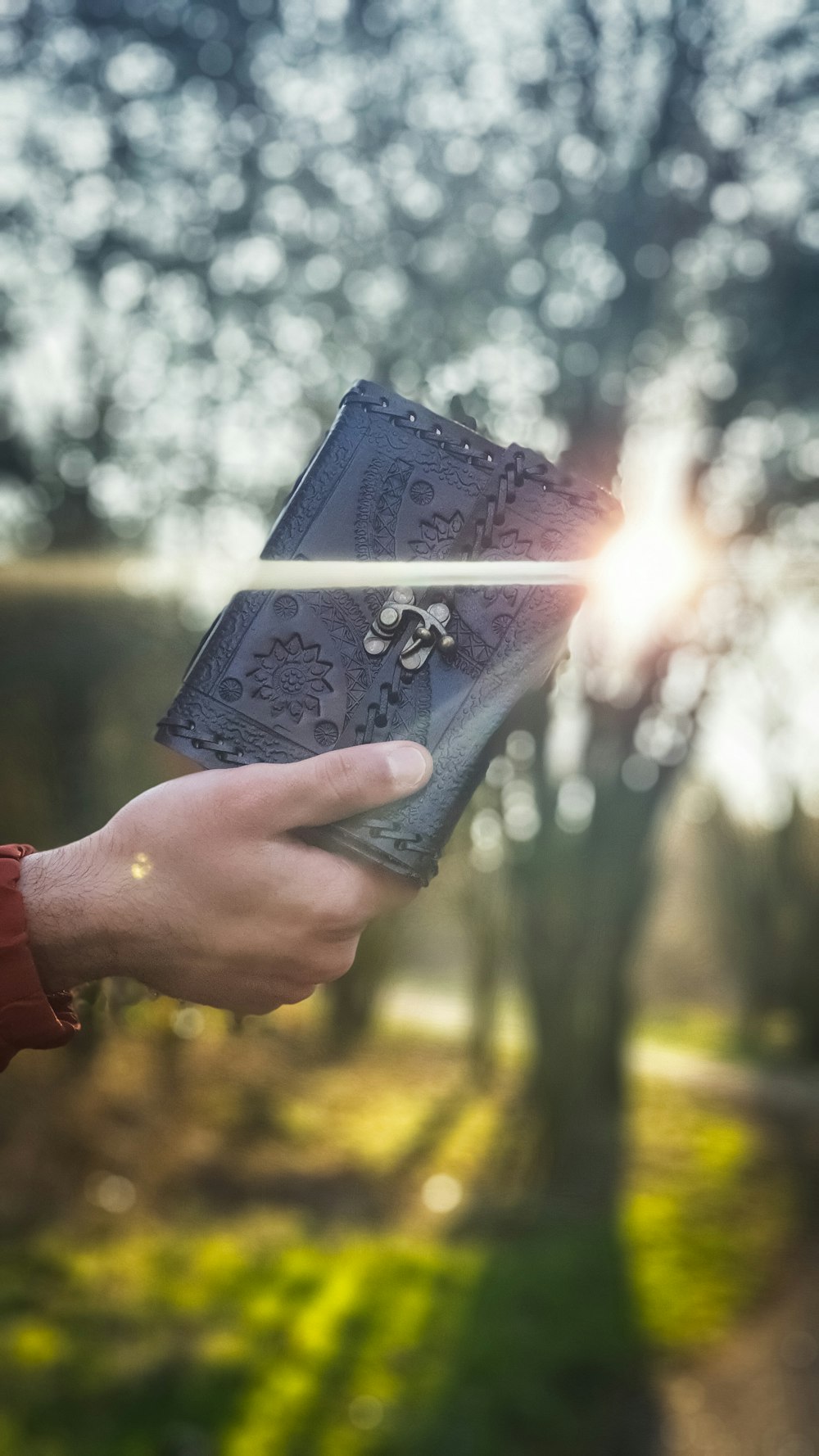 a person holding a book in their hand