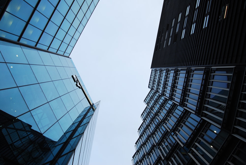 low-angle photo of high-rise buildings