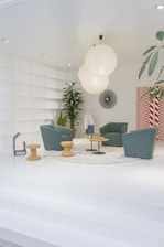 three blue armchairs