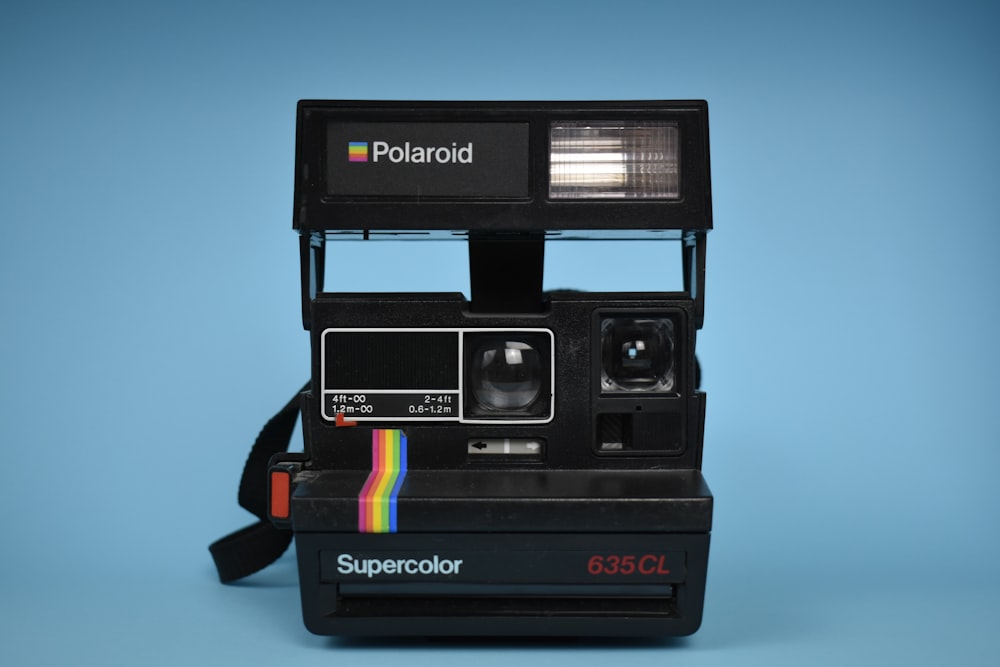 black Polaroid camera illustration