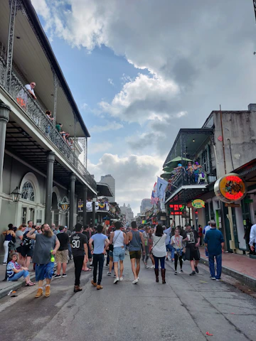 A vibrant street scene in dz with locals enjoying a sunny day, showcasing community life.