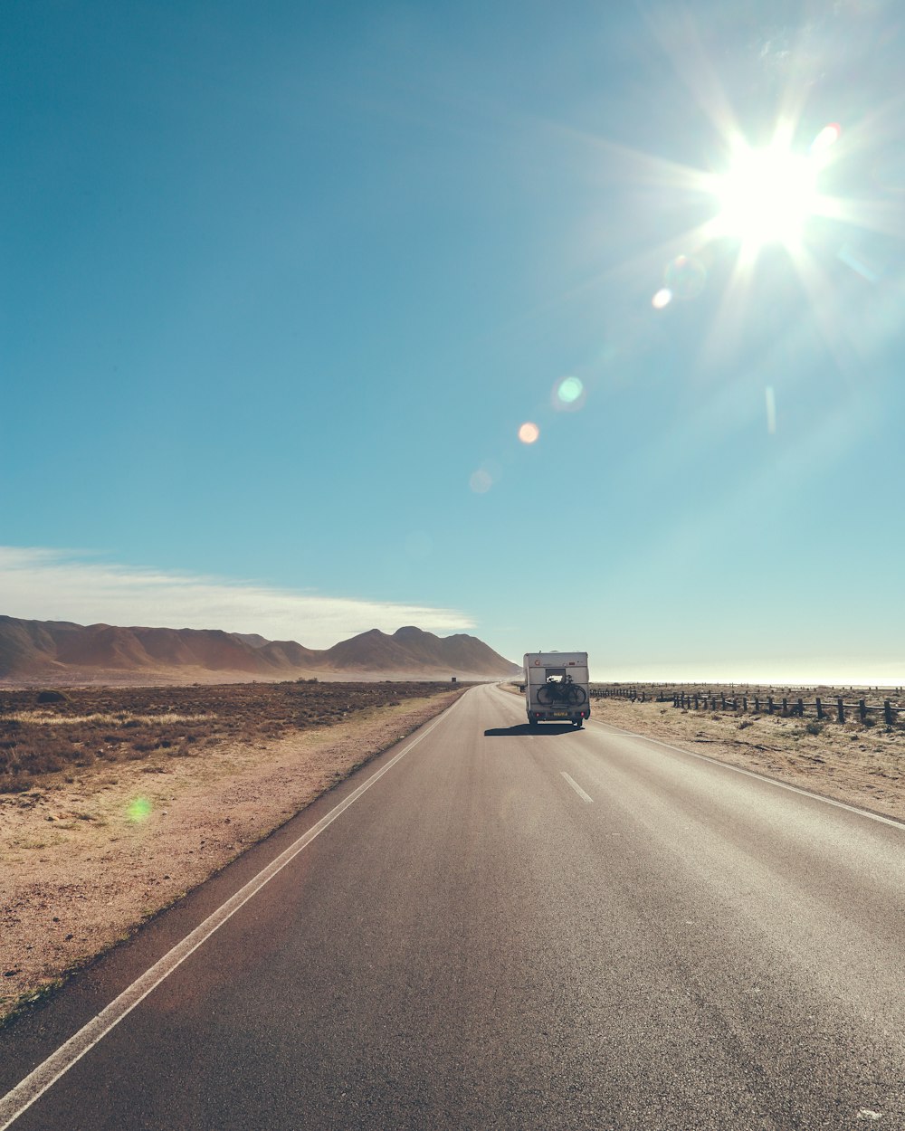 car on black asphalt road