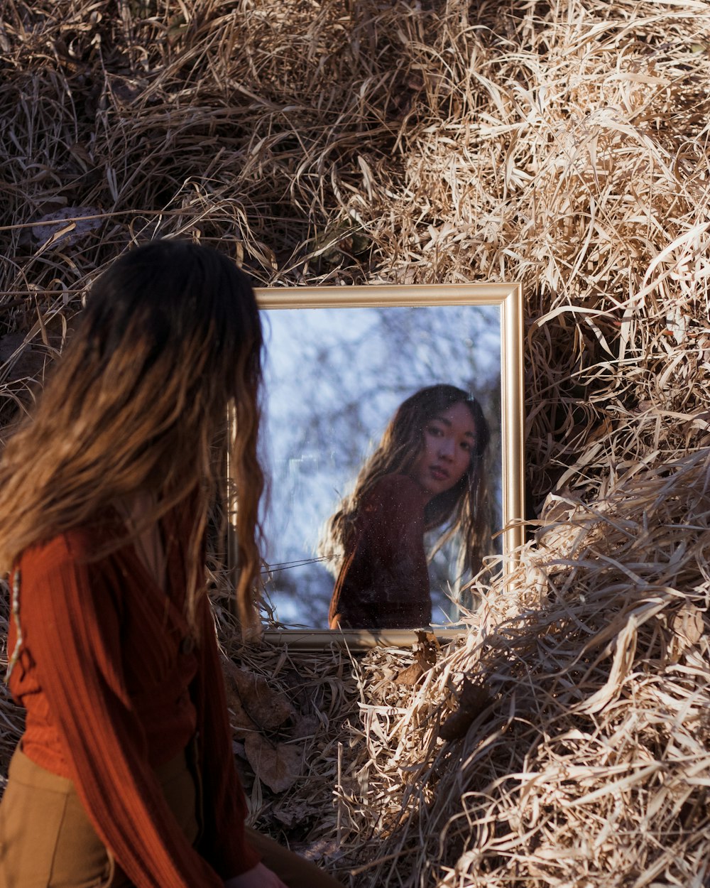 woman facing on mirror outdoor