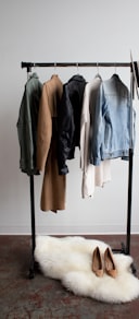 five jackets on clothes rack