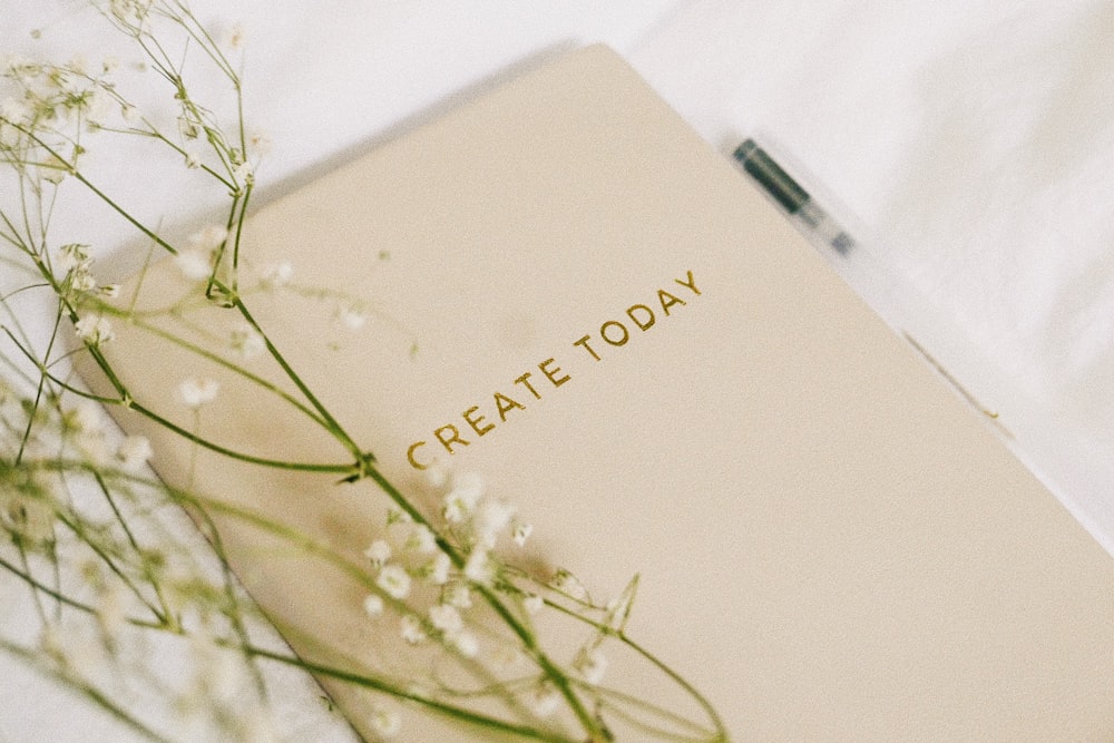 white flowers on book