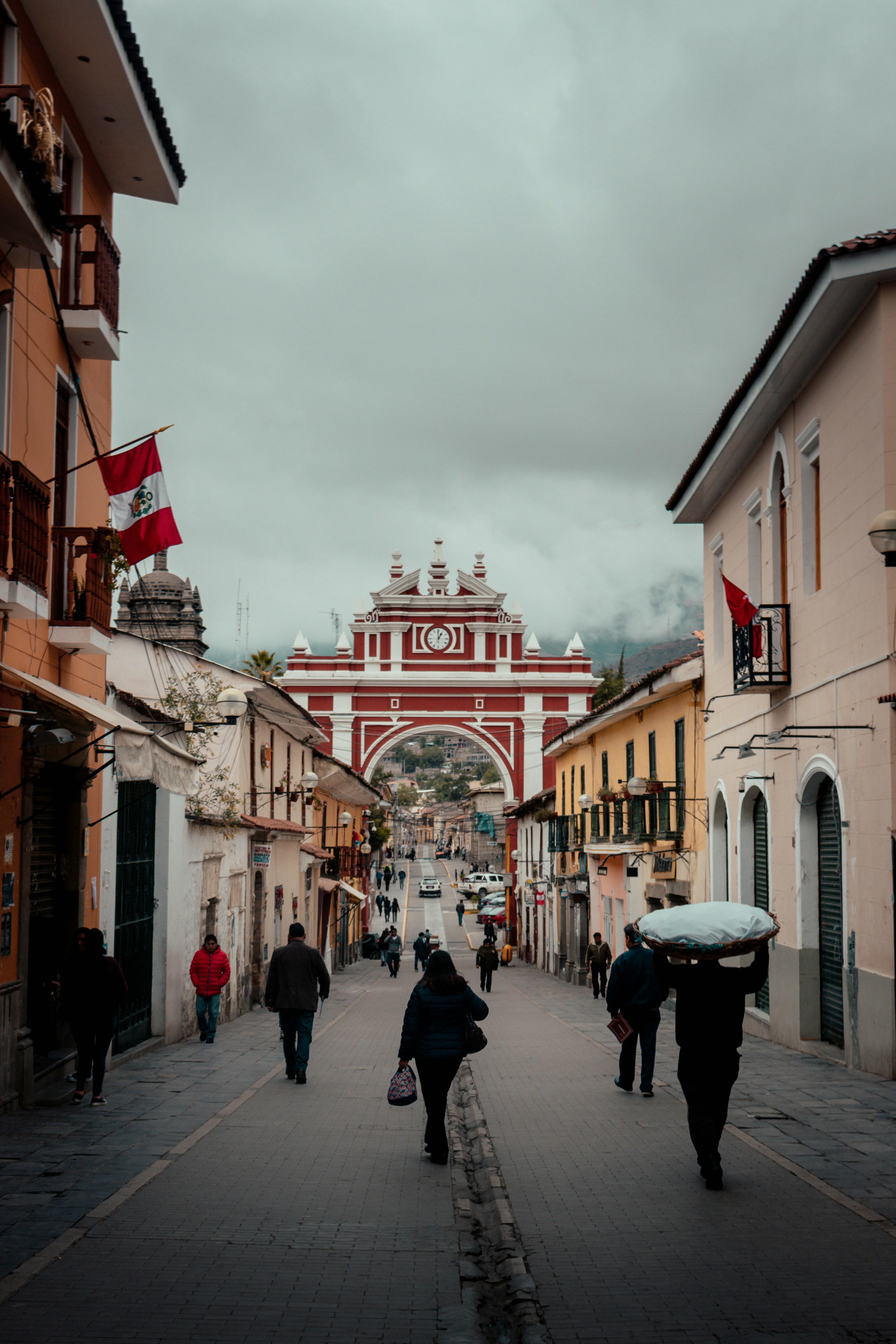 people walking on asphalt road during day time