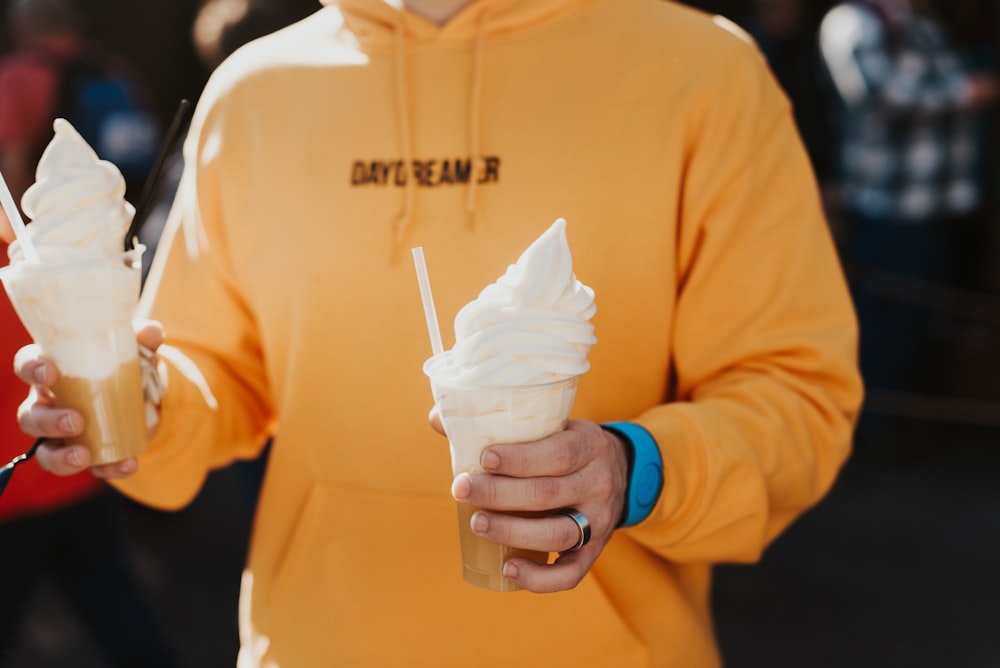 person holding soft ice cream