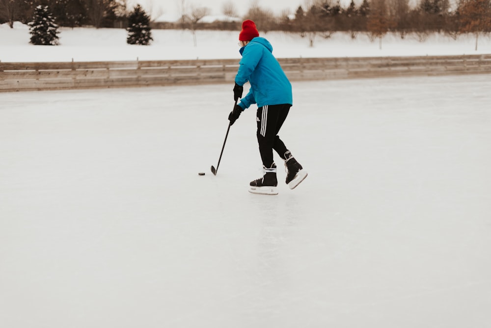 person playing hockey stick