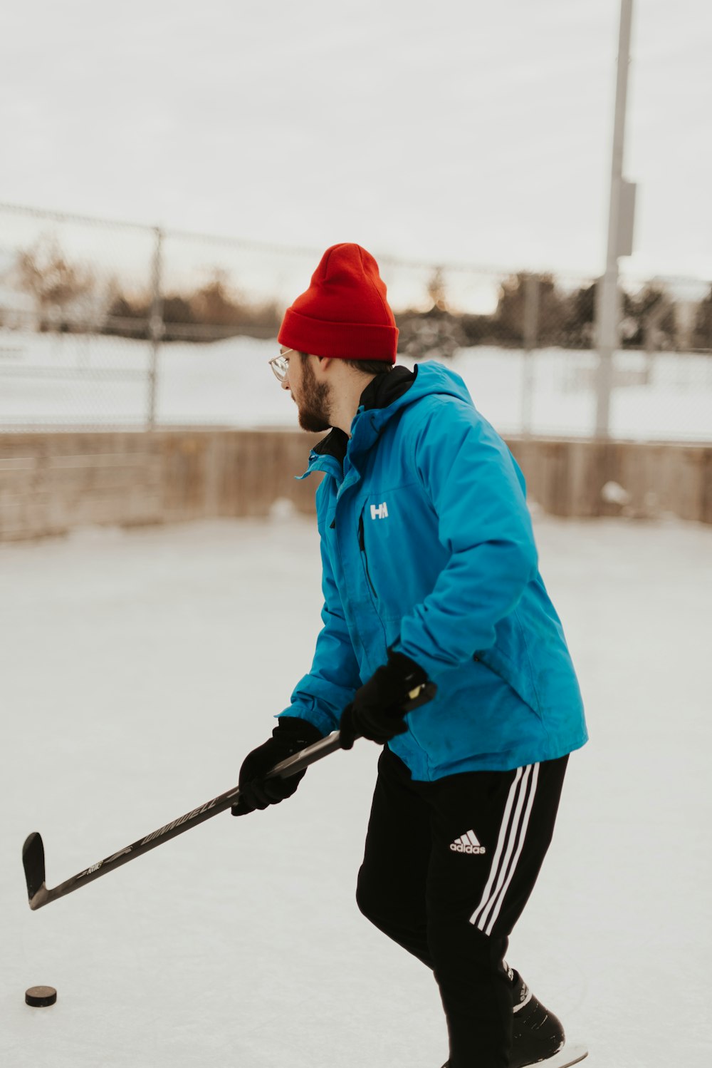 man plating ice hocckey