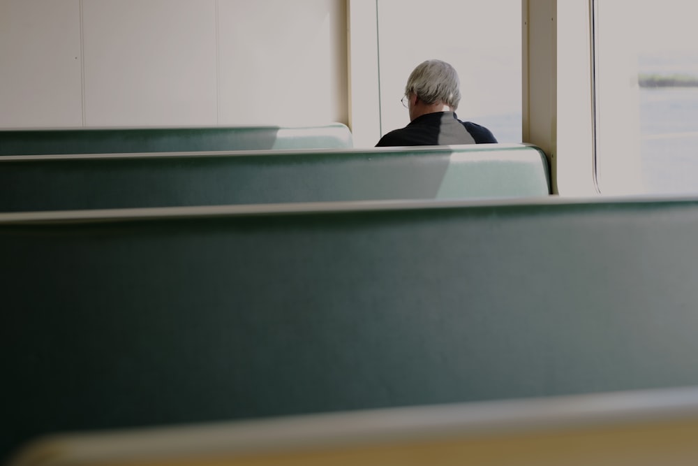 person sitting on bench