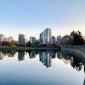 A peaceful Canadian cityscape with autumn leaves, symbolizing stability and growth.