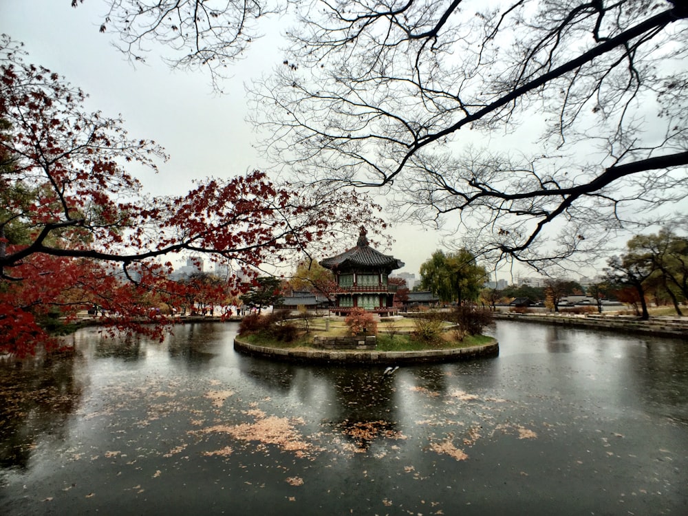 temple on island near trees during day