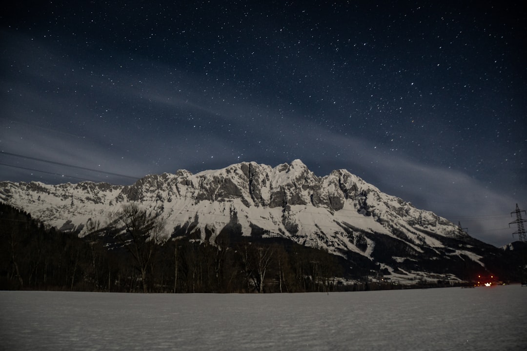 snow covered mountain under blue sky