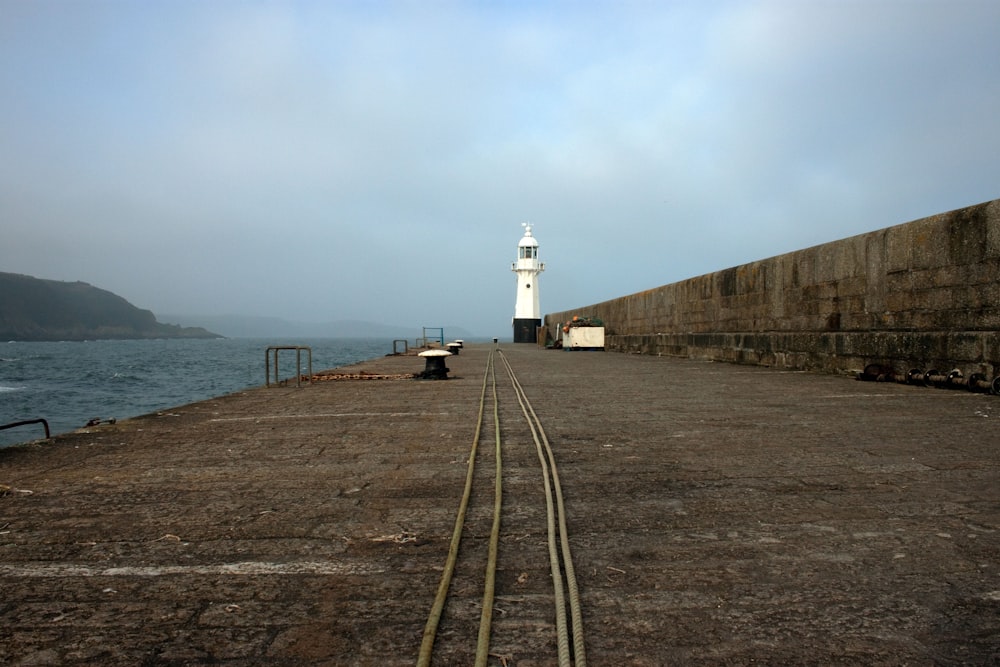 white and black painted lighthouse