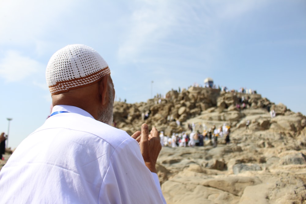 man pray at the hill