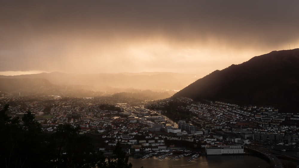 aerial photography of city near mountain