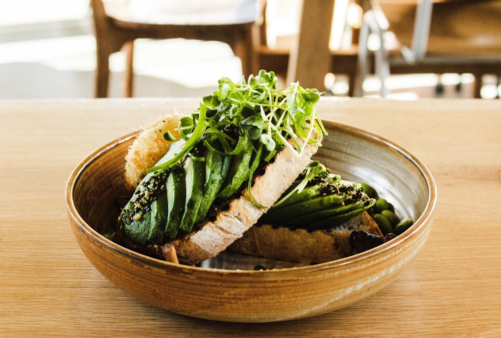 bread and vegetables on bowl