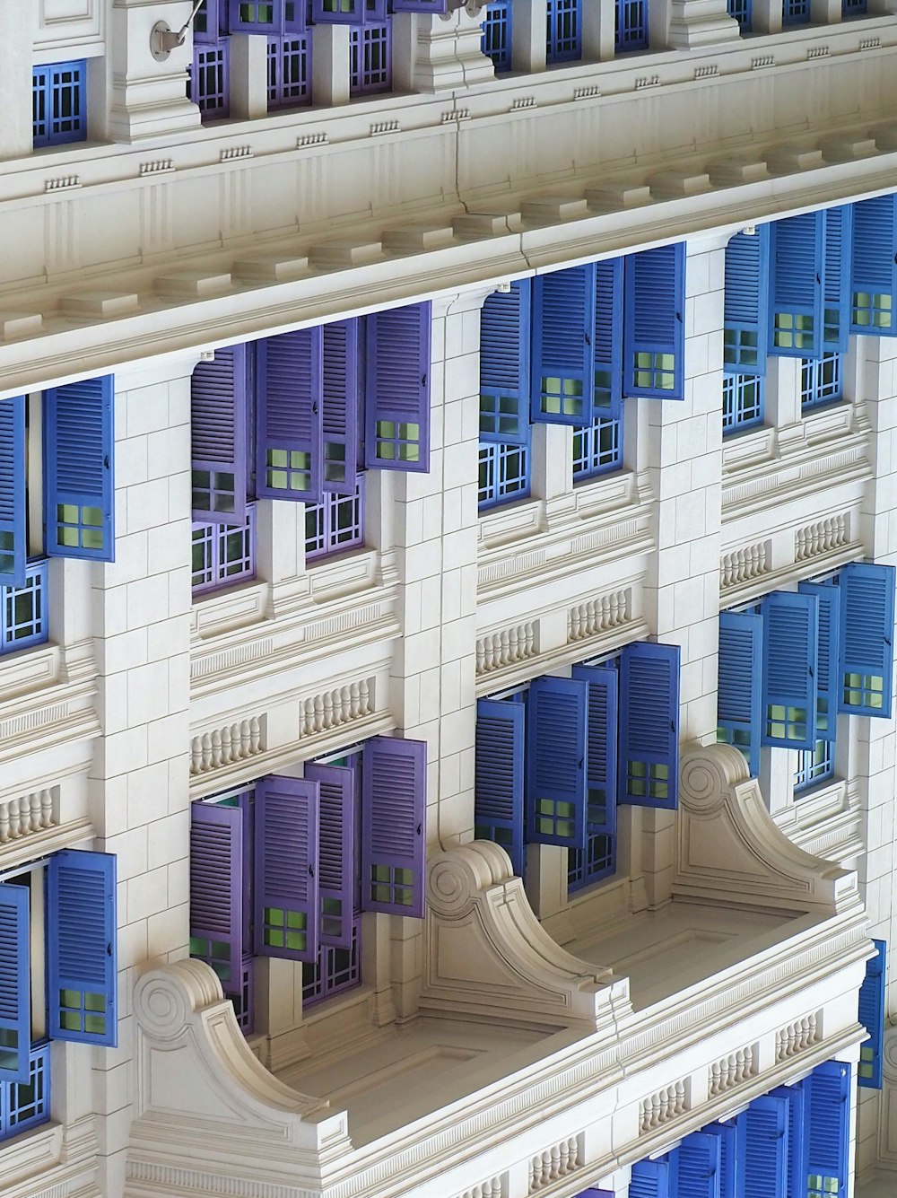 white and blue building in close-up photo