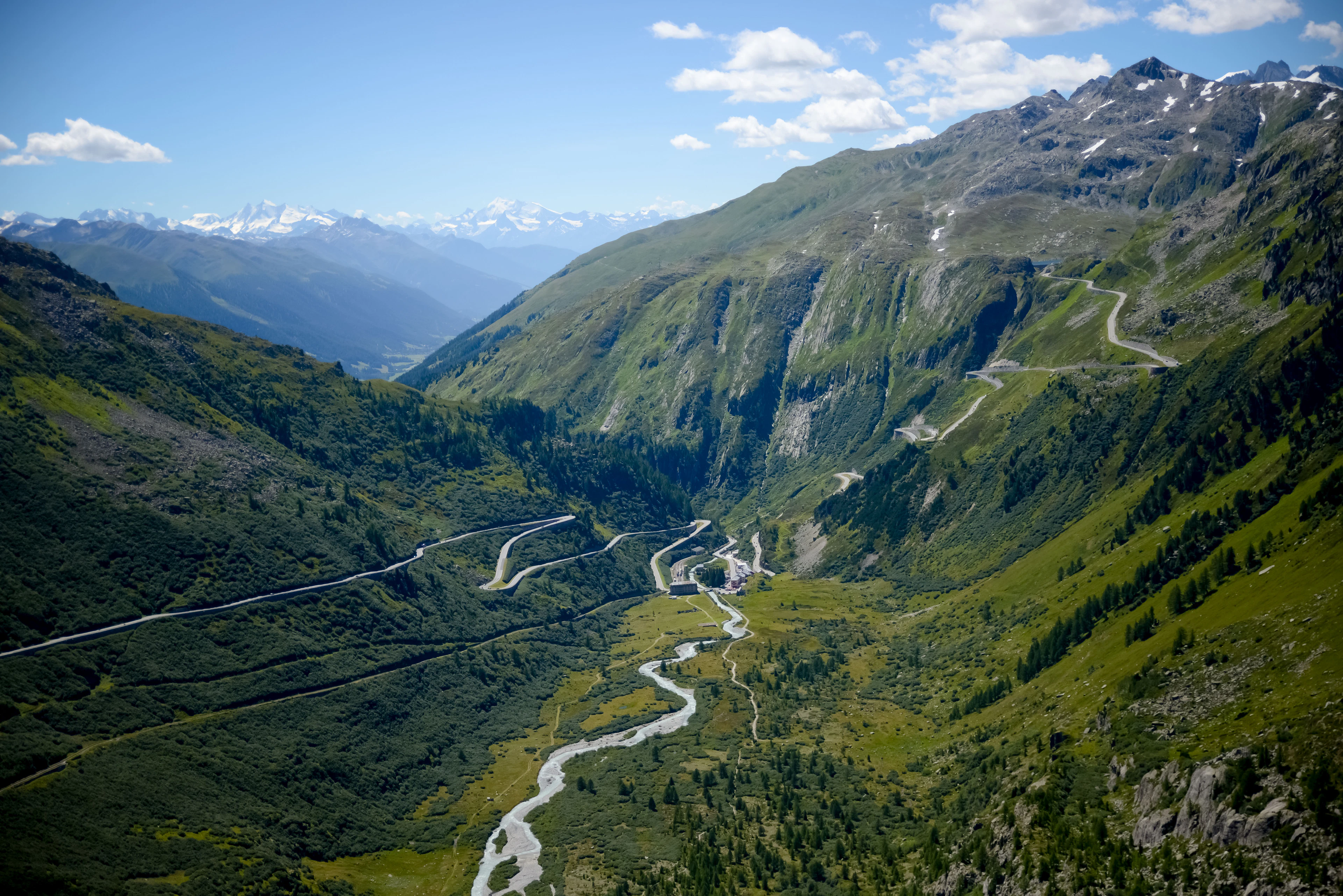 A mountain lake and slopes at the Furka pass
