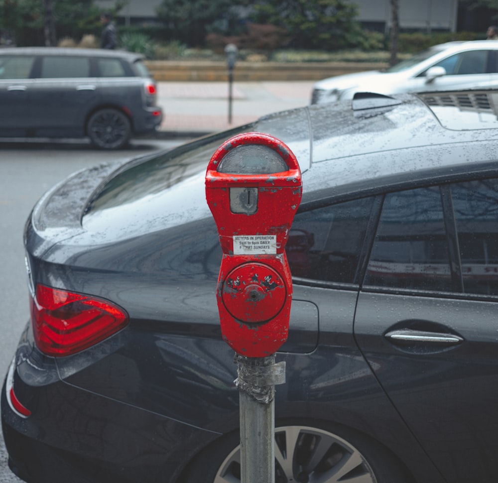 Parcomètre rouge et gris