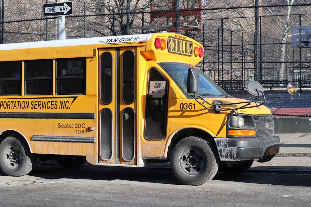 school bus parked near basketball court