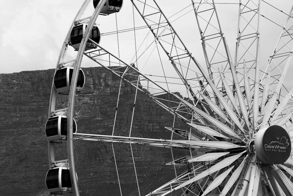 white and black Ferris wheel during daytime