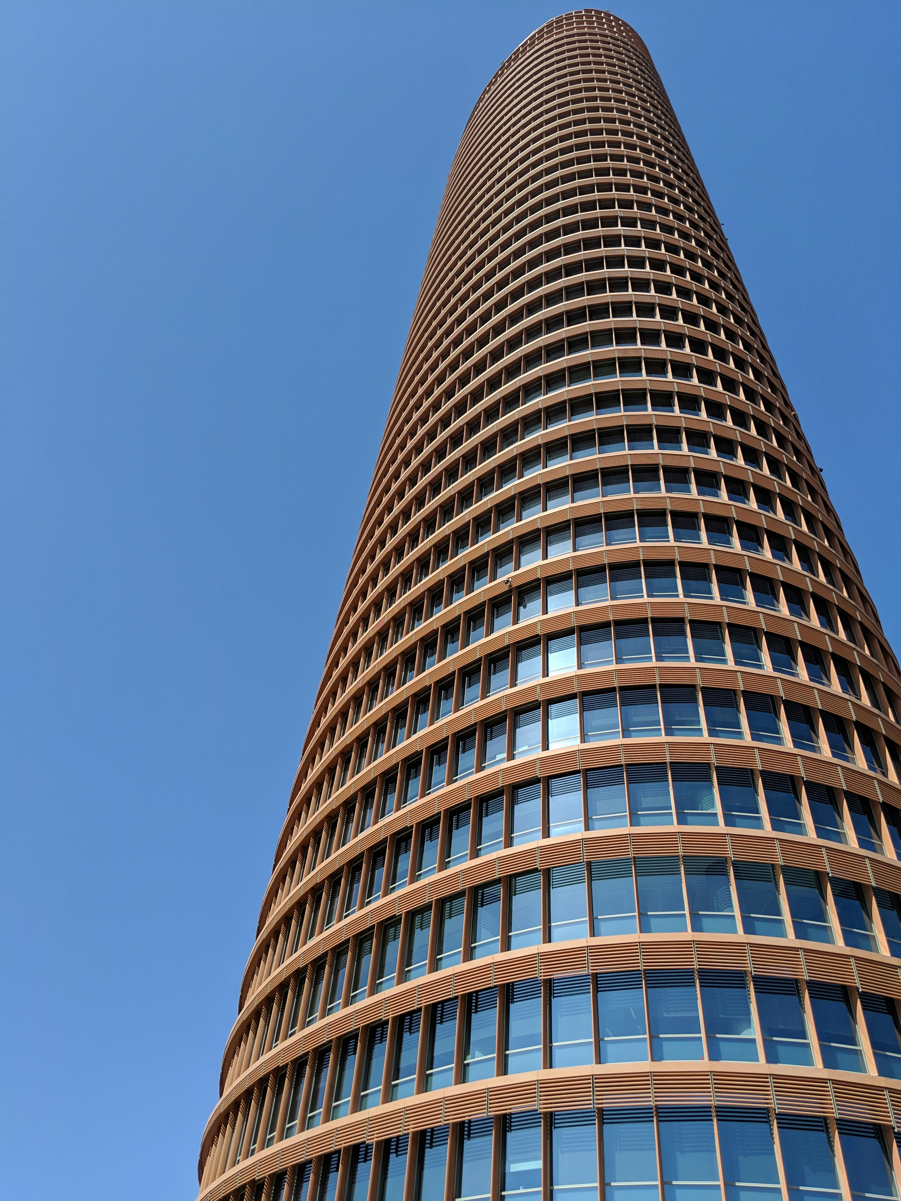low angle photography of brown high-rise building