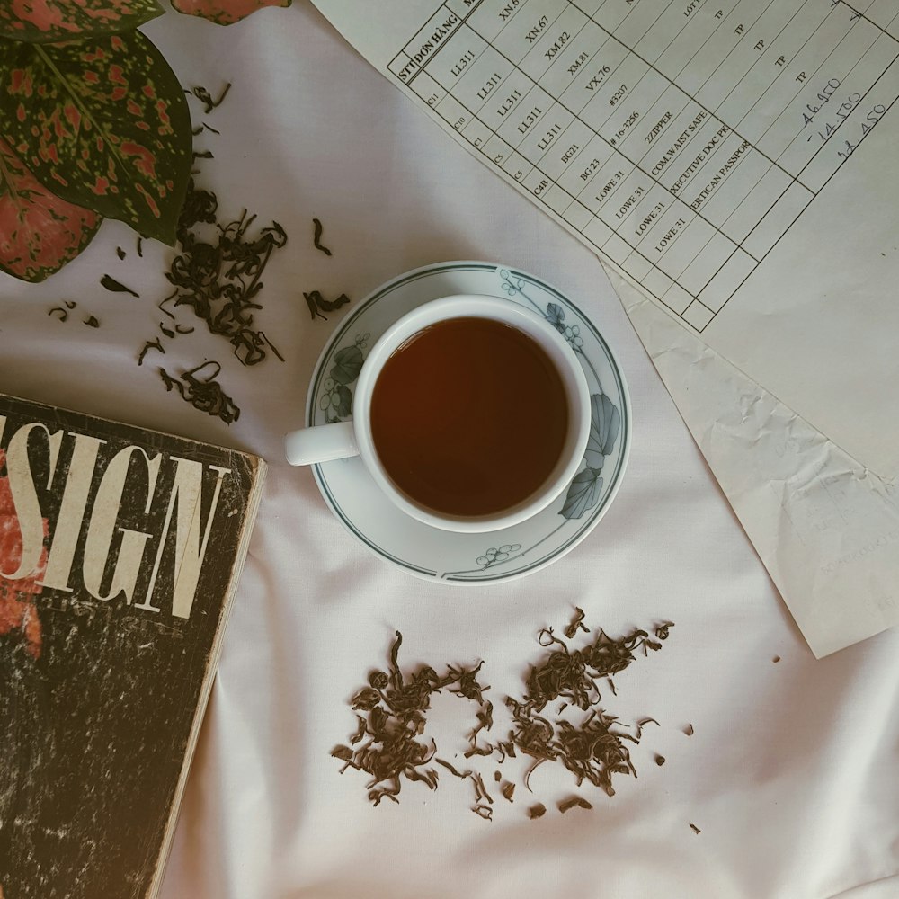 served coffee on white textile