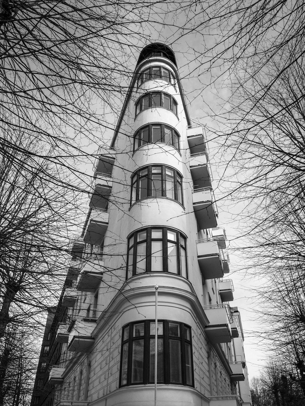 low angle photography of grayscale building