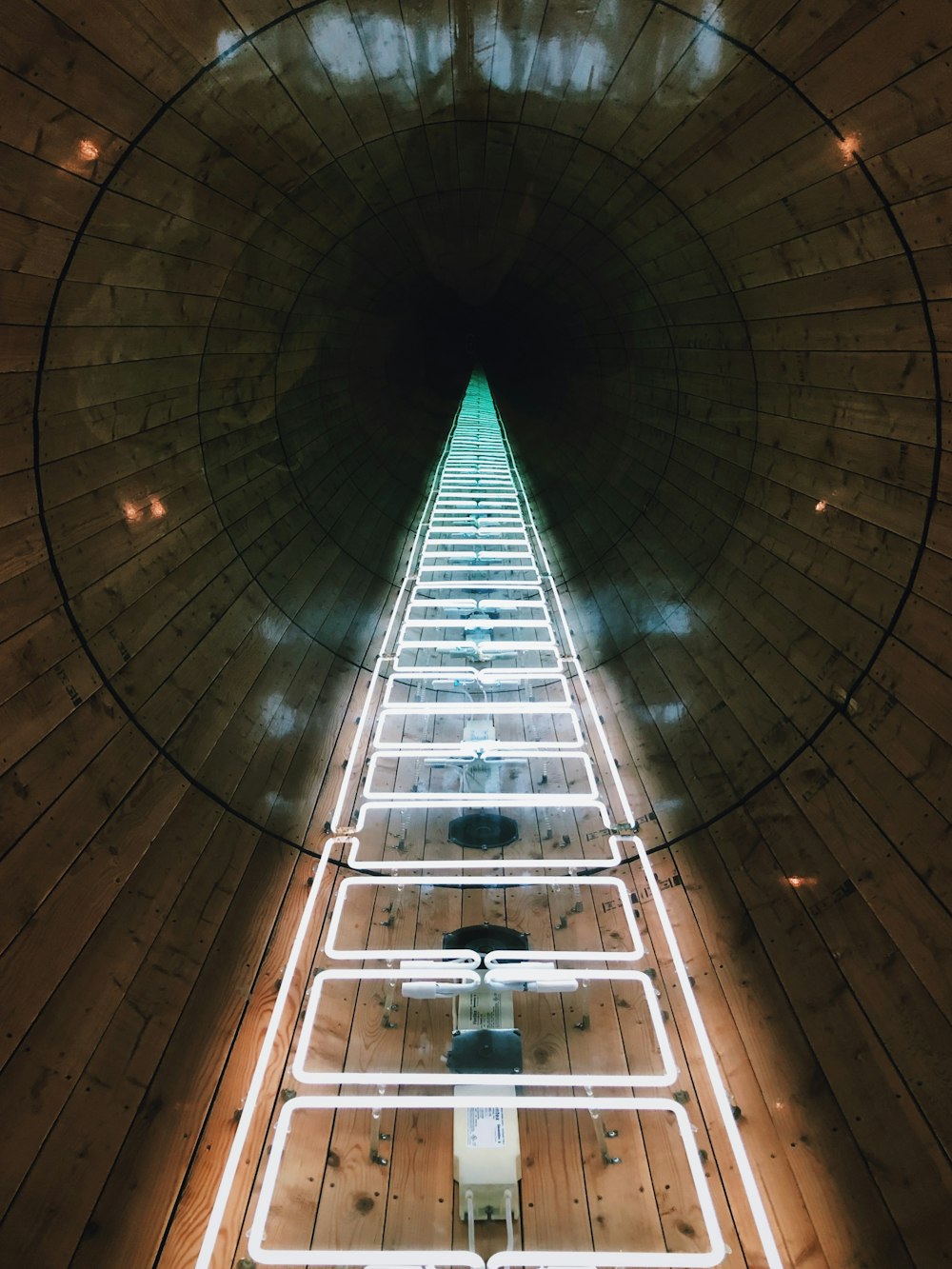 low angle photography of brown building interior