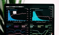 graphs of performance analytics on a laptop screen