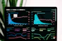 graphs of performance analytics on a laptop screen
