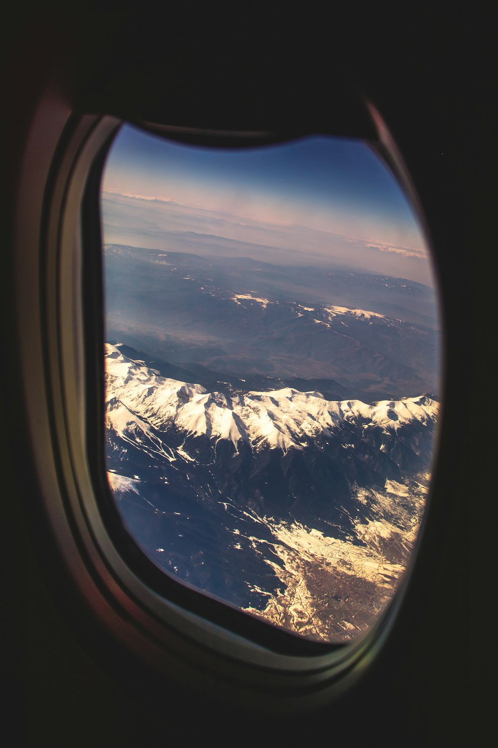 mountain range view from inside plane