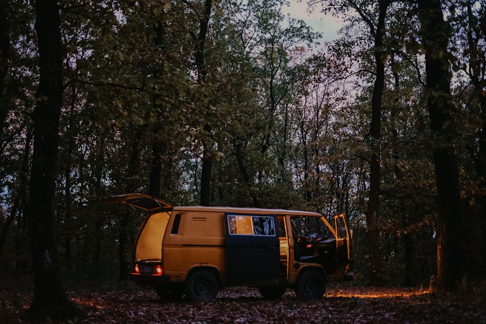 open brown van in forest