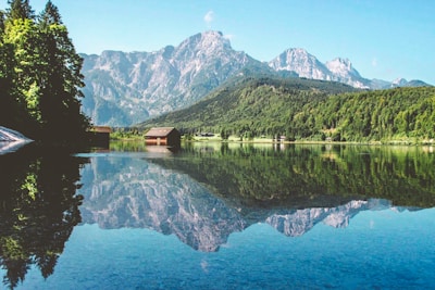 house near mountain and lake view
