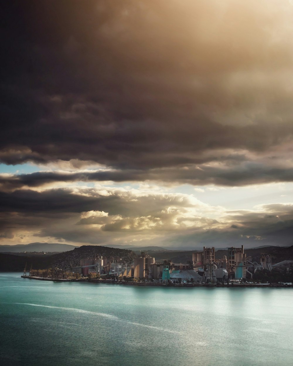 grey cloudy sky over the city by the harbor