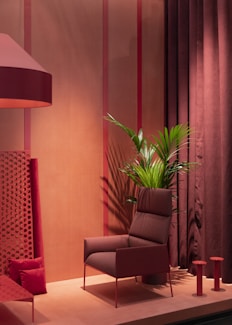 empty gray sofa chair beside palm tree