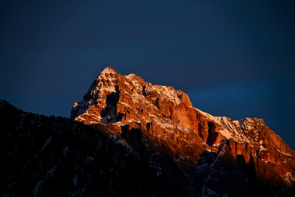 low-angle photography of rocky mountain