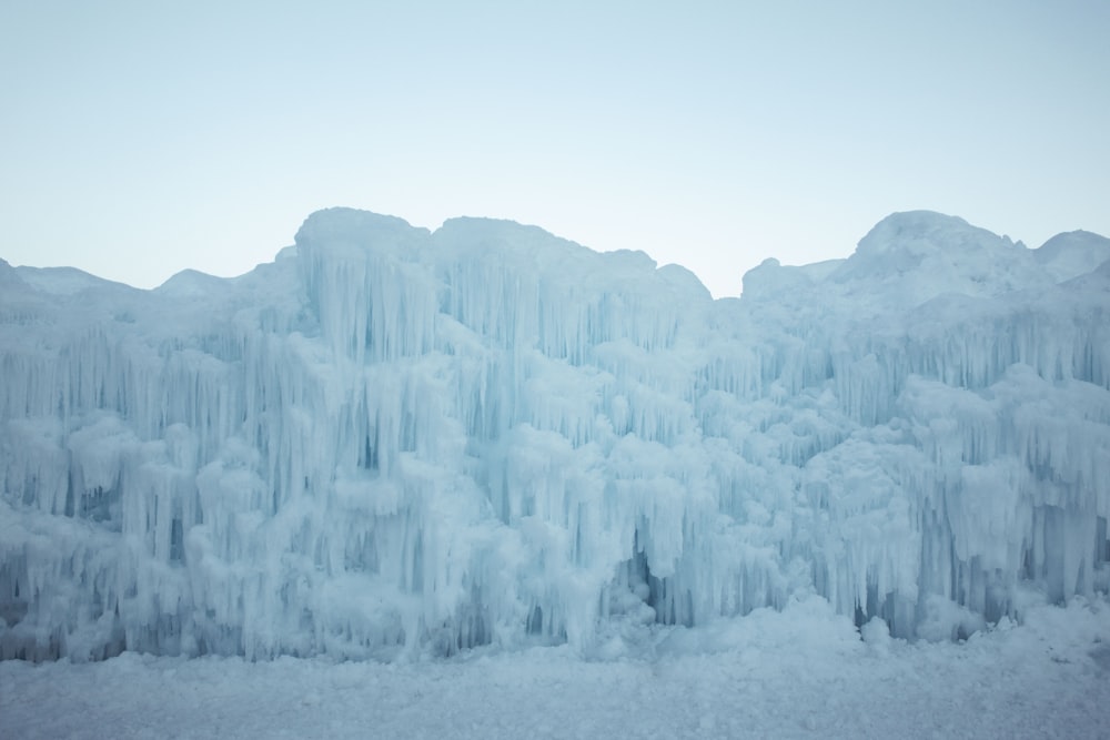 a group of ice formations in the snow