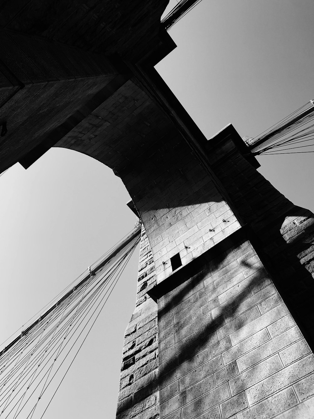 grayscale photography of concrete bridge