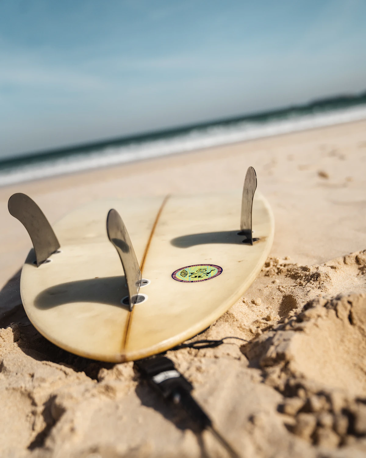 Surfboard showing three fins